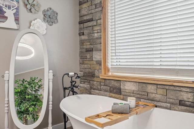 bathroom featuring a tub