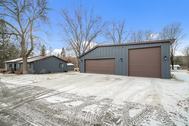 view of snow covered garage