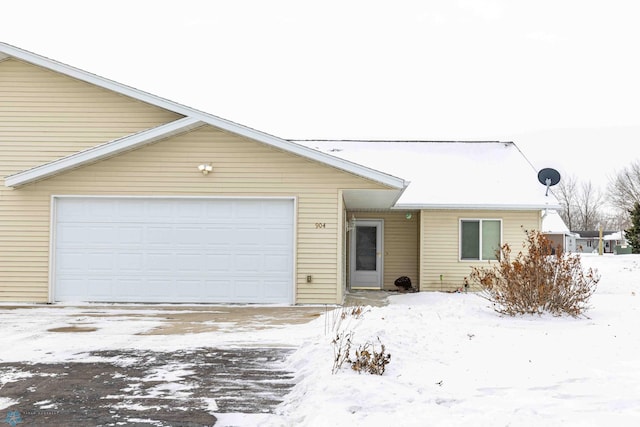 ranch-style house featuring a garage