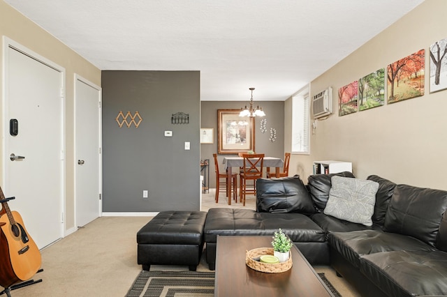 5136 Hiawatha Ave Unit 002, Minneapolis, MN 55417 - living area with carpet floors, baseboards, a wall unit AC, and a notable chandelier