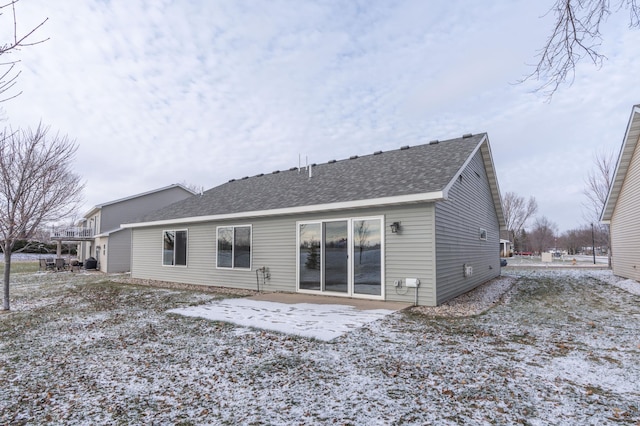 view of snow covered house