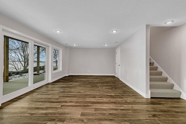 empty room featuring dark wood-type flooring