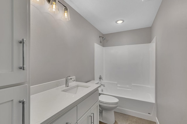 full bathroom with a textured ceiling, vanity, shower / washtub combination, tile patterned flooring, and toilet