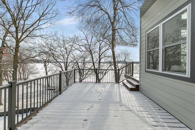 view of snow covered deck