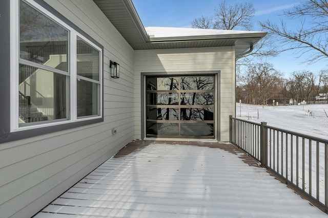 view of snow covered deck