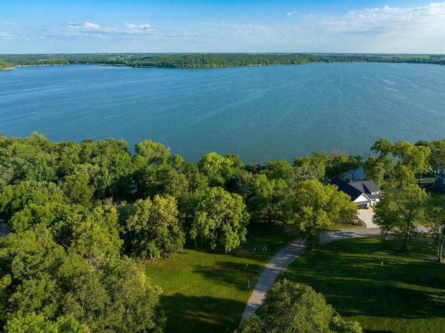 drone / aerial view with a water view