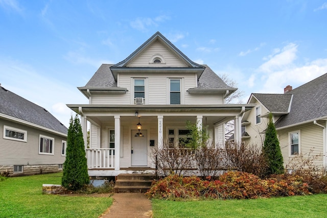 view of front of property with a front yard