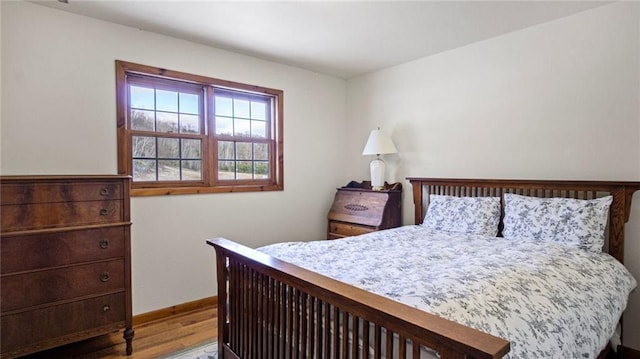 bedroom featuring wood-type flooring