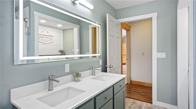 bathroom featuring hardwood / wood-style floors and vanity