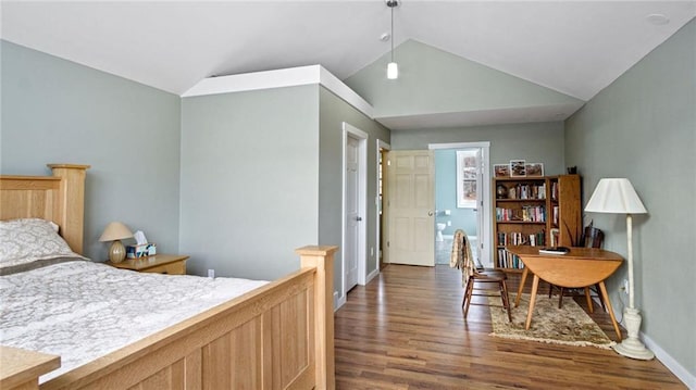 bedroom featuring lofted ceiling and dark wood-type flooring