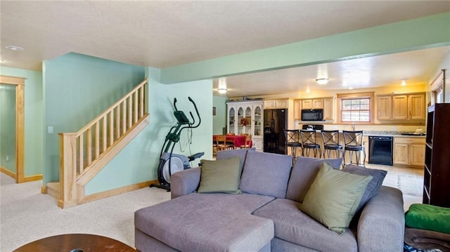 living room with light colored carpet