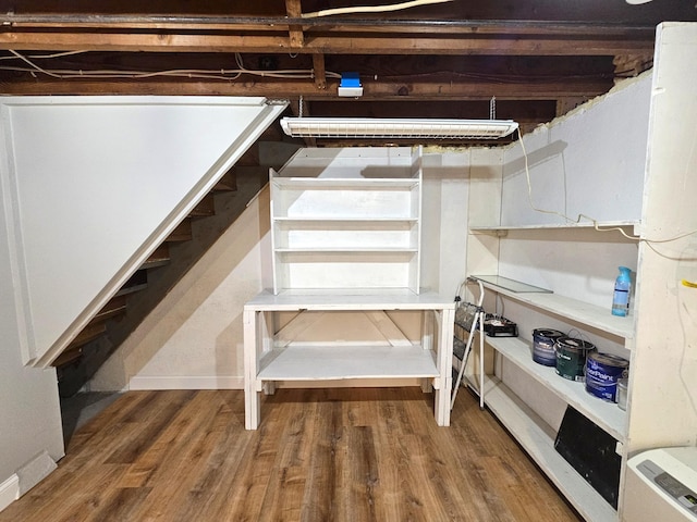 basement with wood-type flooring