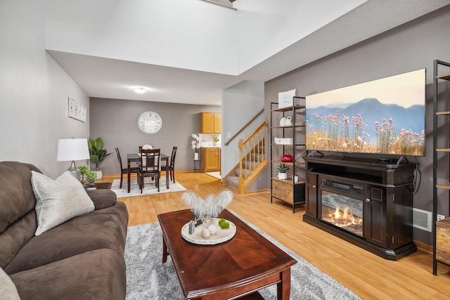 living room with light hardwood / wood-style floors