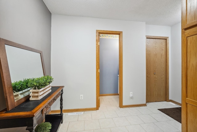 interior space with a textured ceiling