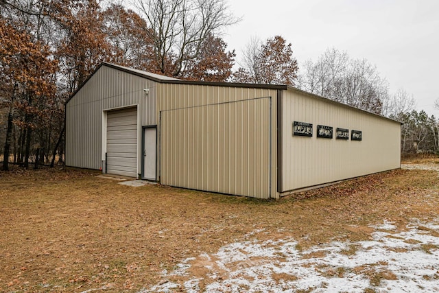 view of outbuilding with a garage