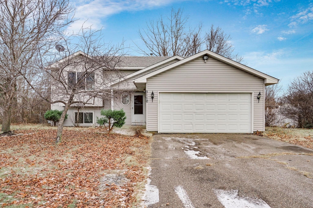 view of front of home featuring a garage