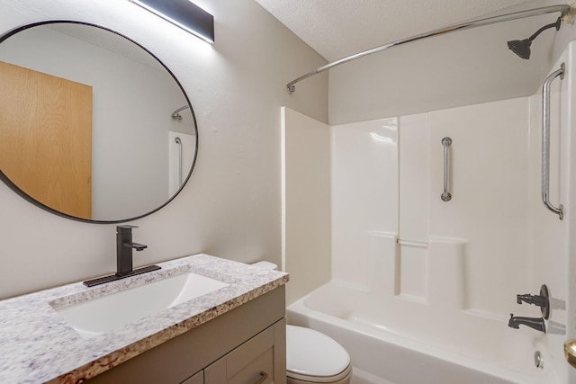 full bathroom with vanity, toilet, a textured ceiling, and shower / washtub combination