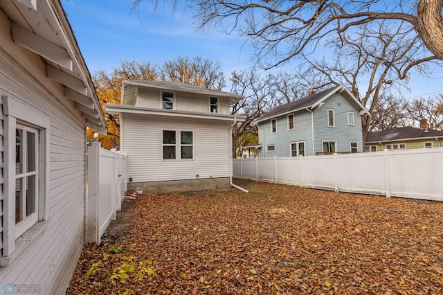 1018 11th St S, Fargo, ND 58103 - rear view of property featuring a fenced backyard