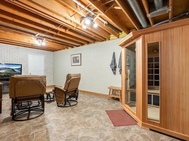 interior space featuring a sauna and stone finish floor