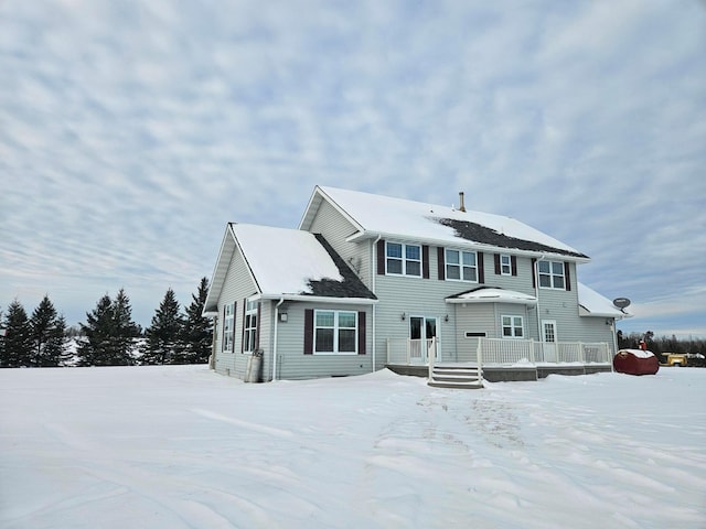 view of snow covered property