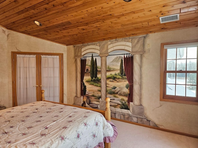 carpeted bedroom with french doors, lofted ceiling, and wood ceiling