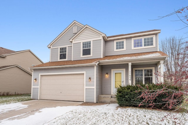 view of front of property featuring a garage