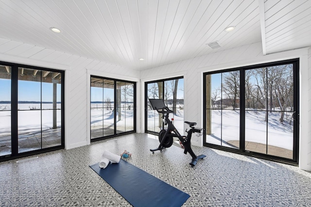 exercise area with recessed lighting and wooden ceiling