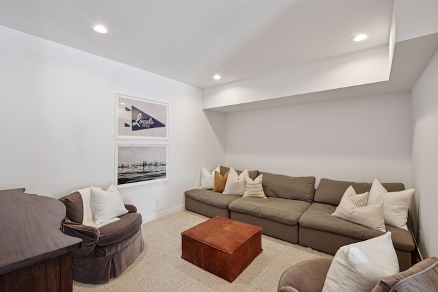 living area featuring carpet flooring, recessed lighting, and baseboards