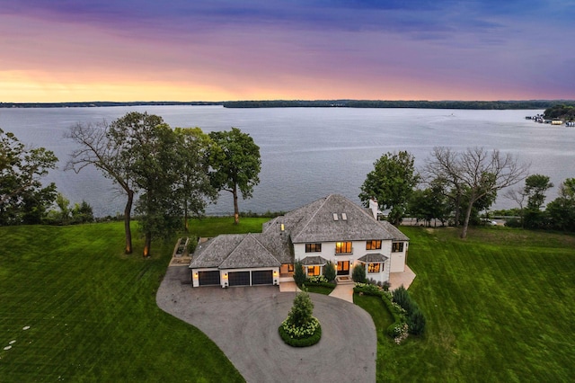 drone / aerial view featuring a water view