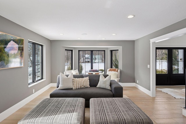 2070 Shoreline Dr, Orono, MN 55391 - living area featuring plenty of natural light, light wood finished floors, and recessed lighting