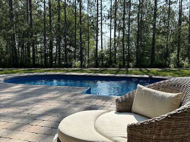 outdoor pool with a patio