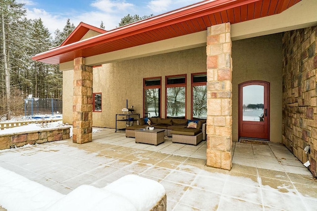 view of patio with an outdoor hangout area and a trampoline