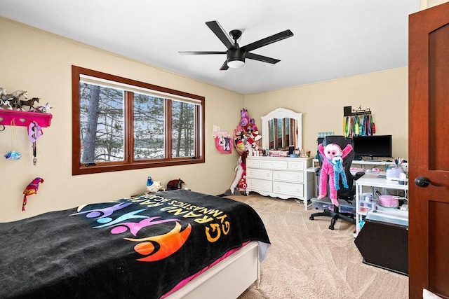 carpeted bedroom featuring a ceiling fan