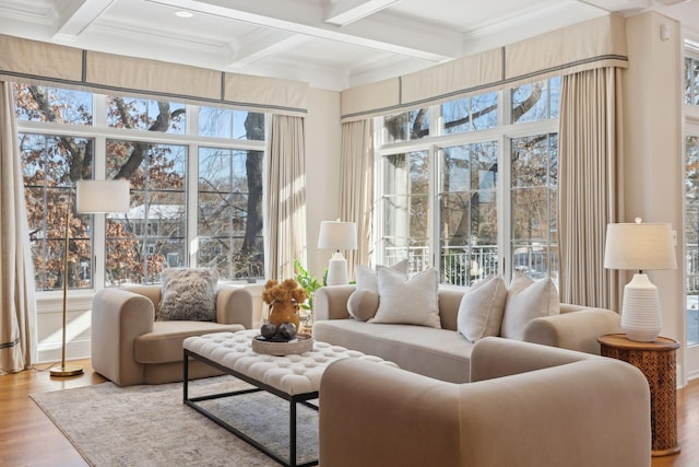 sunroom featuring coffered ceiling and beam ceiling