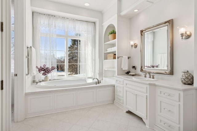 bathroom featuring vanity and a bathing tub