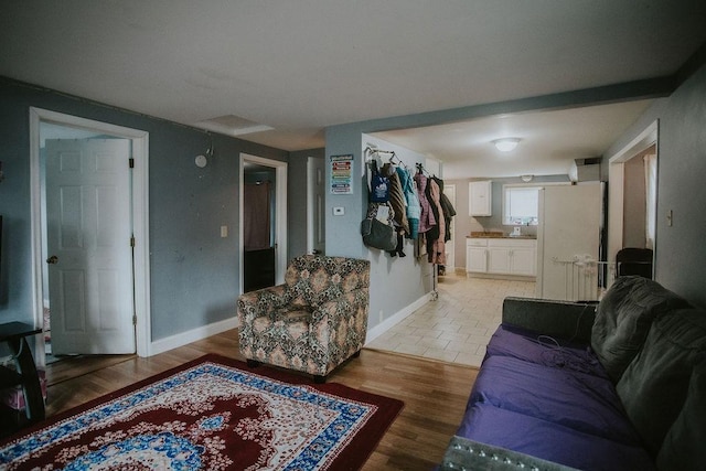 living room with light hardwood / wood-style flooring