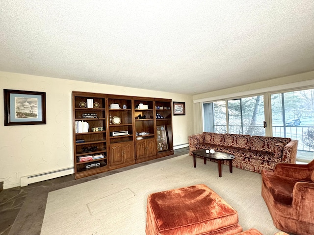 living room featuring carpet floors, a textured ceiling, and baseboard heating