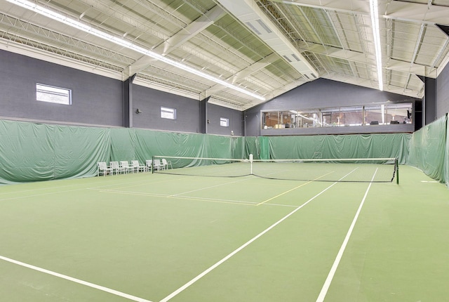 view of tennis court with fence