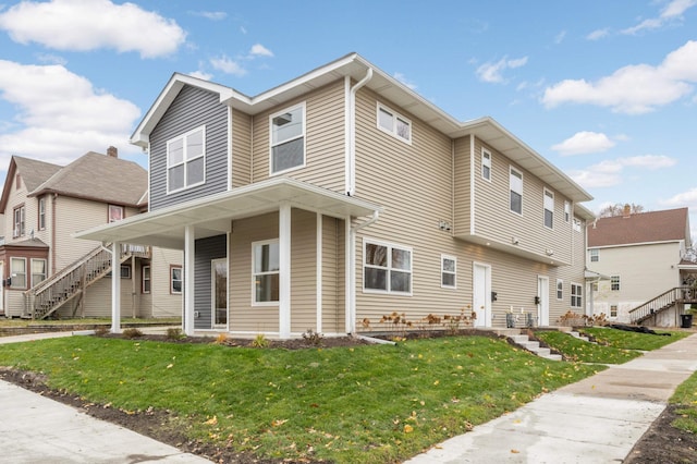 view of front facade with a front lawn