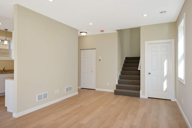 interior space with light hardwood / wood-style flooring