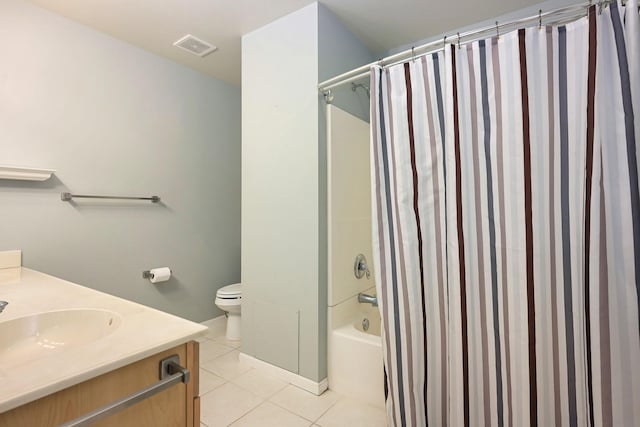 bathroom with visible vents, toilet, shower / tub combo with curtain, tile patterned flooring, and vanity