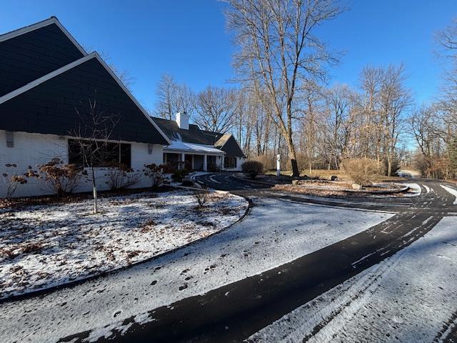 view of snow covered property