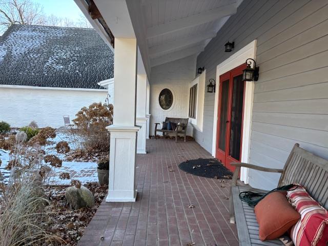 view of snow covered deck