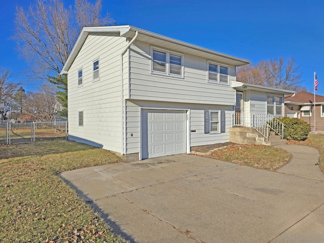 split level home featuring a garage