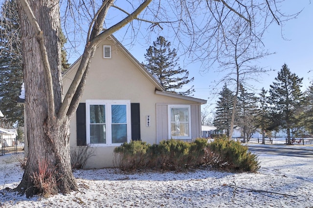 view of snow covered property