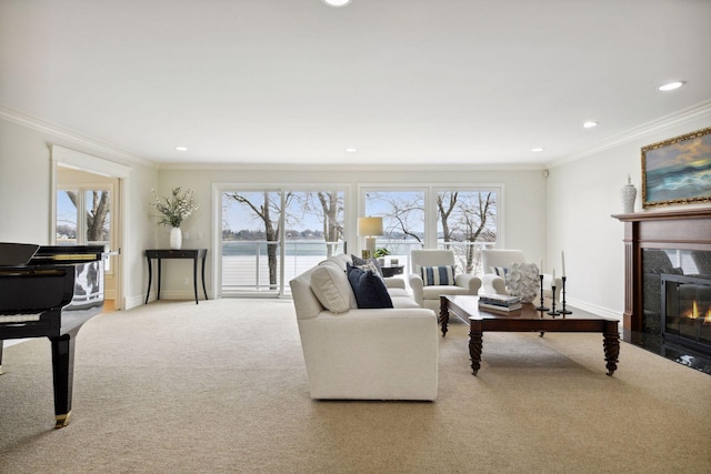 2496 Old Beach Rd, Orono, MN 55391 - carpeted living area featuring ornamental molding, a high end fireplace, recessed lighting, a water view, and baseboards