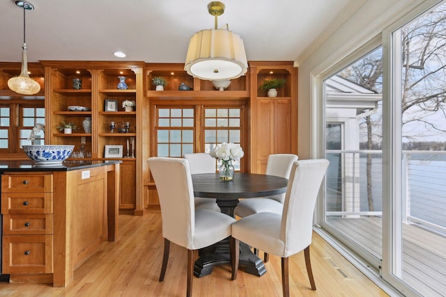 2496 Old Beach Rd, Orono, MN 55391 - dining space featuring light wood-style flooring