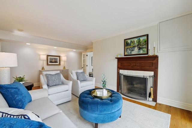 2496 Old Beach Rd, Orono, MN 55391 - living area featuring a fireplace with flush hearth, wood finished floors, ornamental molding, baseboards, and recessed lighting