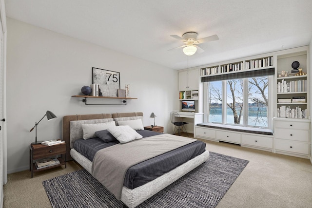 2496 Old Beach Rd, Orono, MN 55391 - bedroom featuring light carpet and ceiling fan