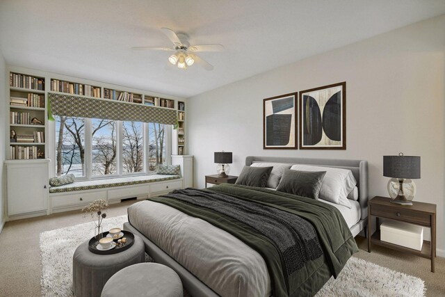 2496 Old Beach Rd, Orono, MN 55391 - bedroom with light colored carpet and a ceiling fan